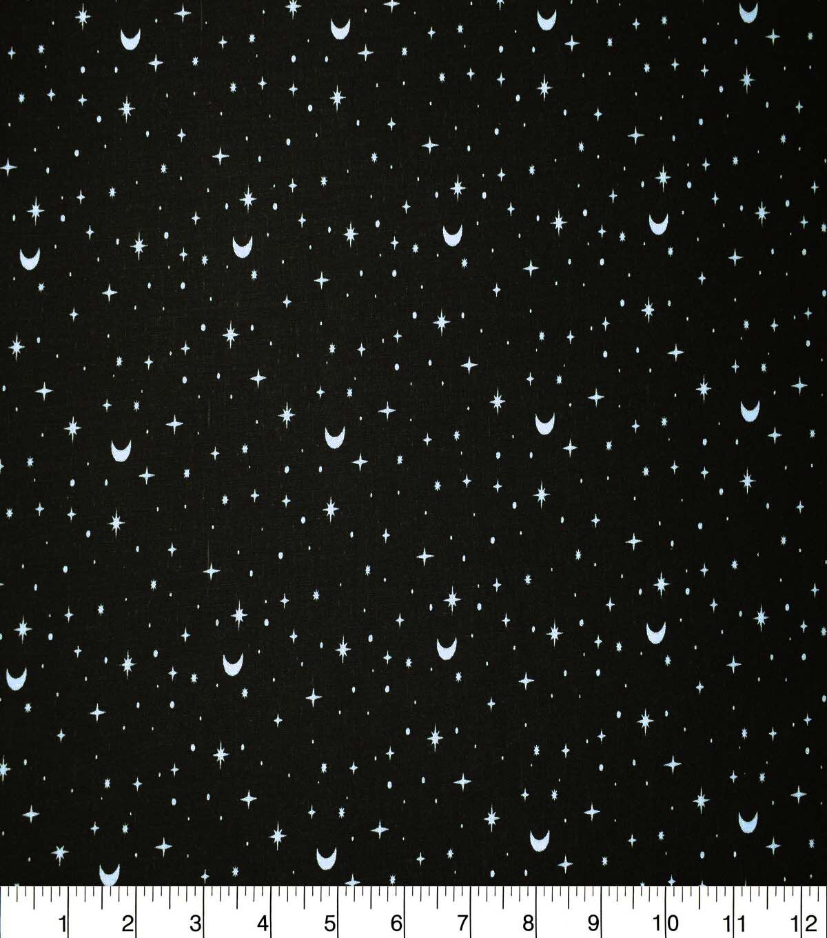 Stars & Moons on Black Cotton Fabric by Quilter’s Showcase