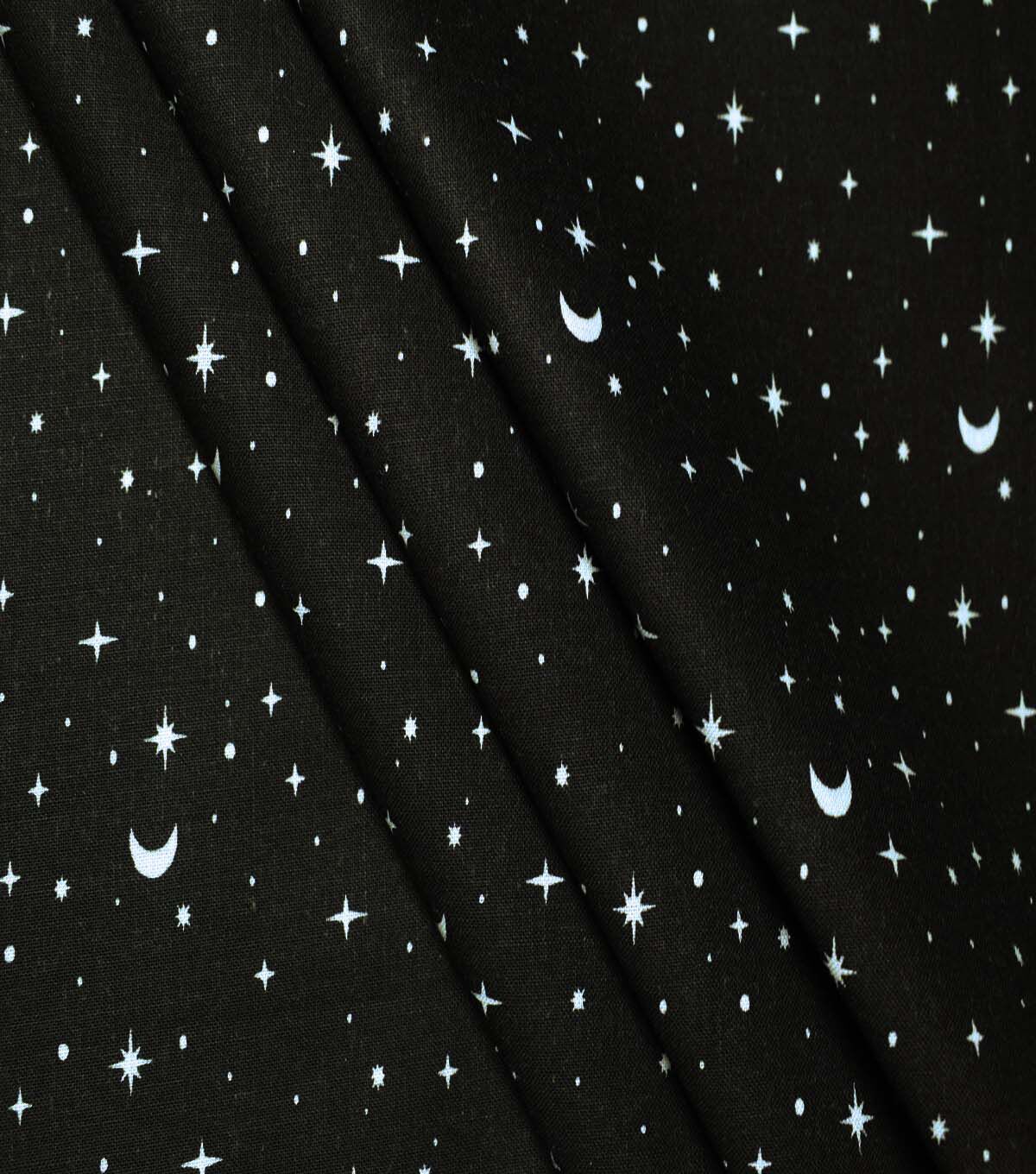 Stars & Moons on Black Cotton Fabric by Quilter’s Showcase